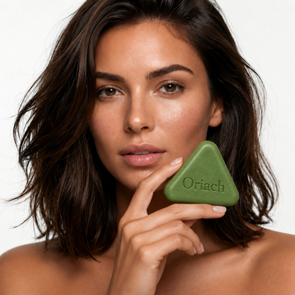 Campaign model holding the green Oriach scalp bar