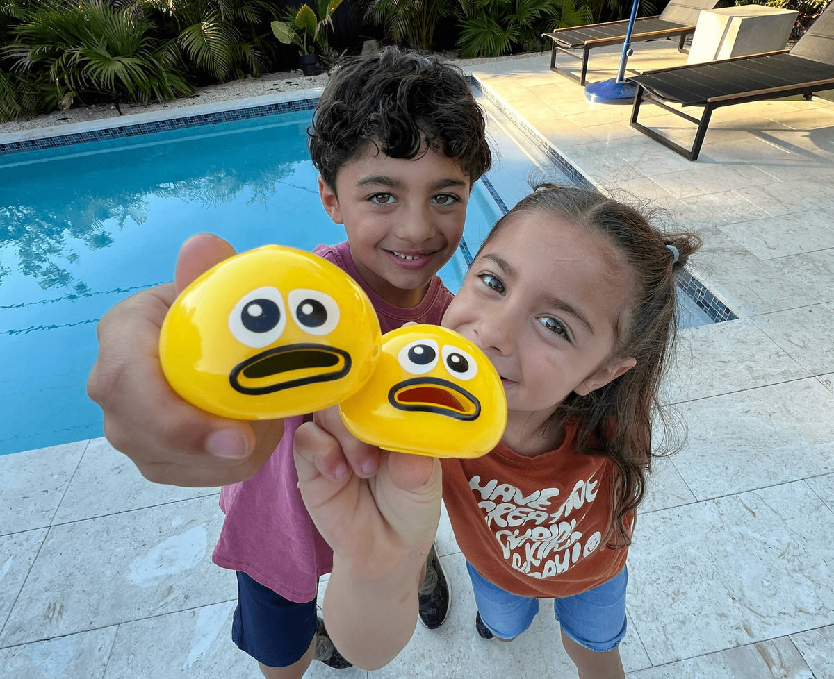 Children playing with Puking Ball