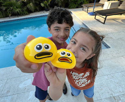 Children playing with Puking Ball